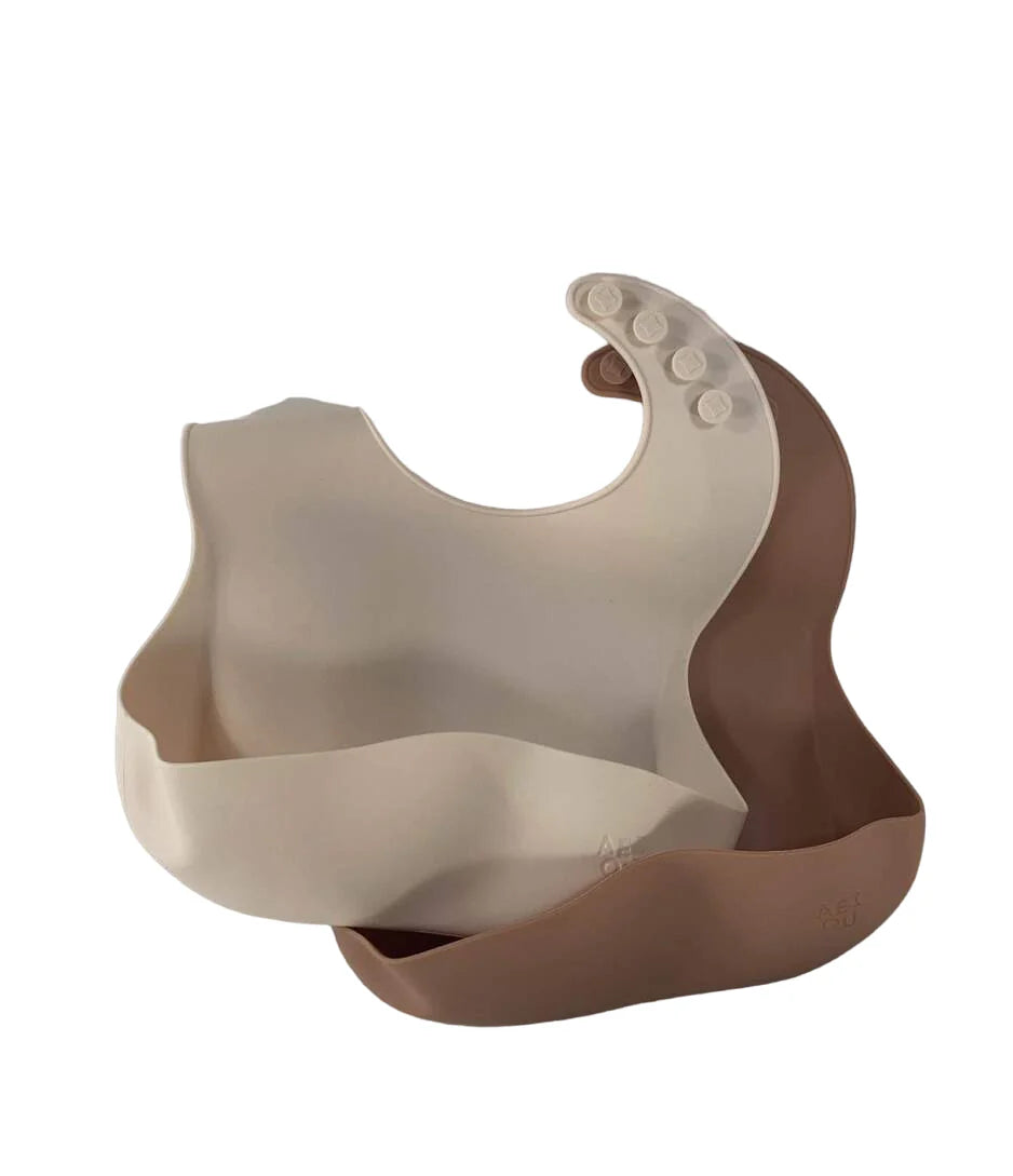 Paquete de 2 baberos AEIOU, color arcilla/avena