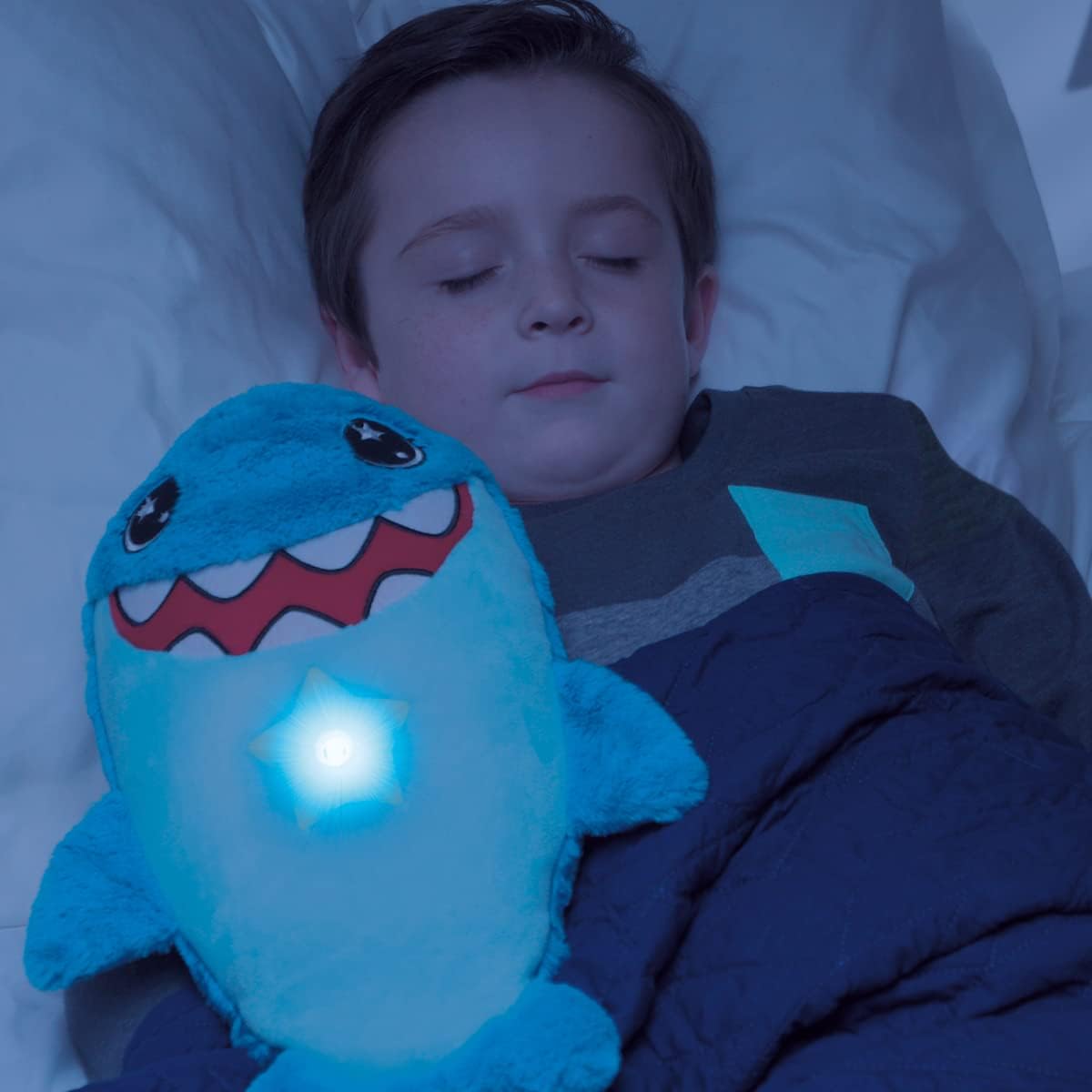 Star Belly Dream Lites- Peluche tiburón Que proyecta un Cielo de Estrellas de Colores en la habitación.