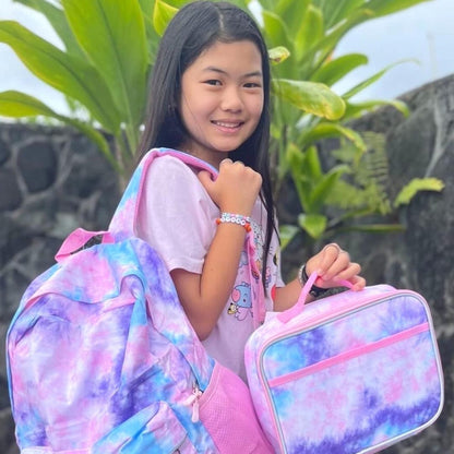 Lonchera de color rosa con teñido