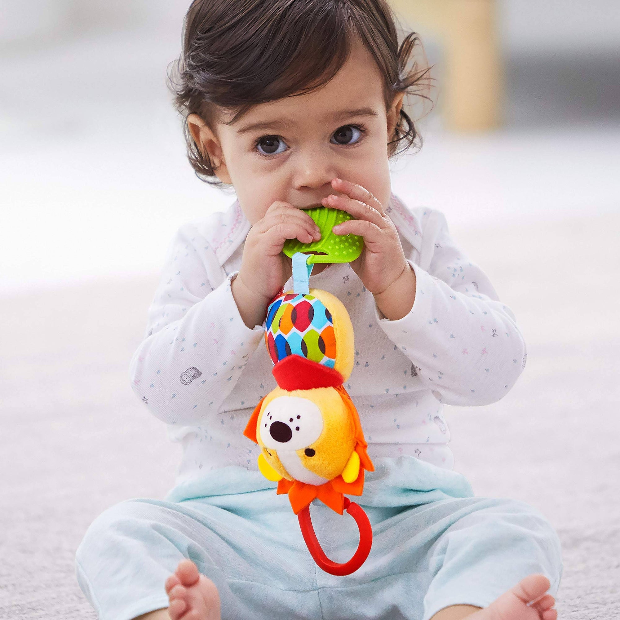 Skip Hop Bandana Buddies-Juguete de Actividad para Bebés con Timbre y Mordedor, León.