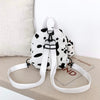 Mochila de vaca con colgante de vaca de felpa con estampado de vaca