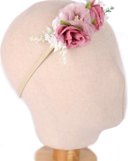 Fotografía de recién nacidos con diademas de flores para bebés