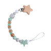Clip con forma de estrella con cuentas de Silicona y madera