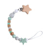 Clip con forma de estrella con cuentas de Silicona y madera