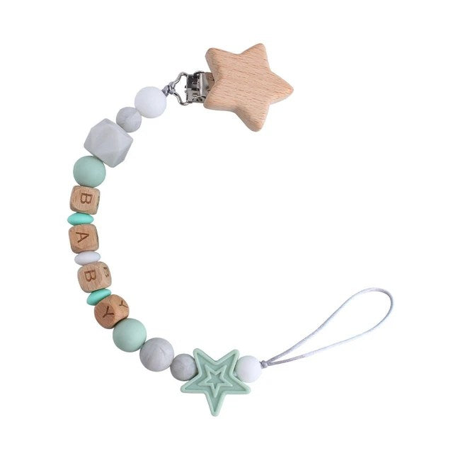 Clip con forma de estrella con cuentas de Silicona y madera