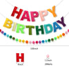 Cartel de feliz cumpleaños, guirnalda de bolas de fieltro de color arcoíris