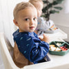 Babero impermeable para bebé Tiny Twinkle Mess Proof
