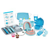 Melissa & Doug - Juego de dentista Super Smile con conjunto de dientes y accesorios dentales para juego simulado