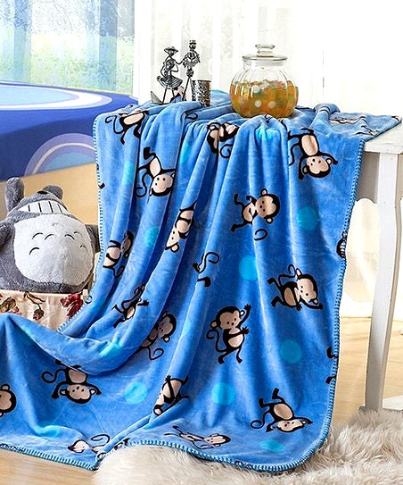 Smiling home- Cobija para niños reversible diseño monos/estrellas azul