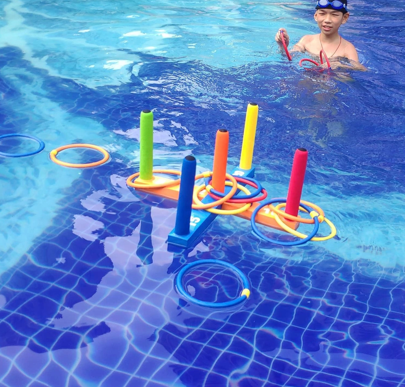 Juego de lanzamiento de aros para niños