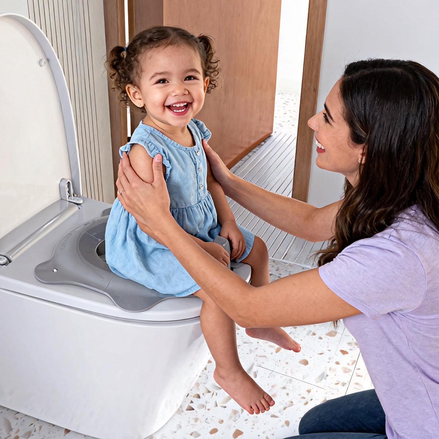 Asiento de inodoro plegable para niños