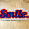 Alfombra smile para habitación