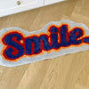 Alfombra smile para habitación