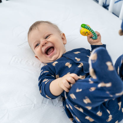 Protector de colchón para cuna