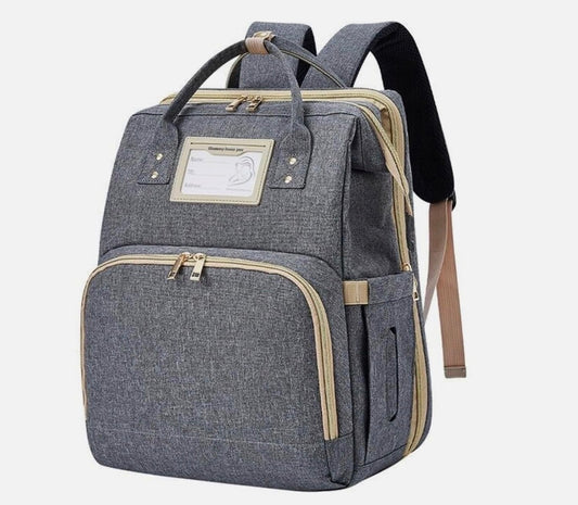 Mochila pañalera con cambiador gris