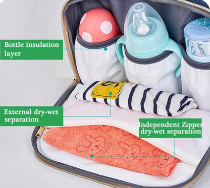 Mochila pañalera con cambiador gris
