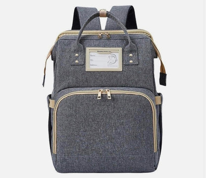 Mochila pañalera con cambiador gris
