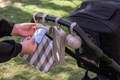 Ubbi Dispensador de bolsas retráctiles para bolsa de pañales