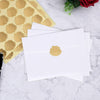 20 sobres con stickers doradas con diseño de corazon